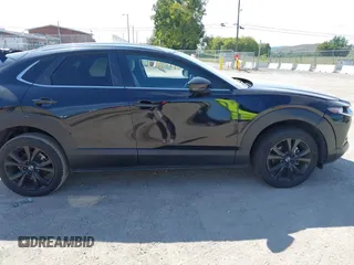 2022 Mazda CX-30 2.5 Turbo with VIN 3MVDMBAY4NM452705, listed as a IAAI auction lot 40101452 with 18,873 mi miles and . Bid and sale history available at DreamBid. Image 13.
