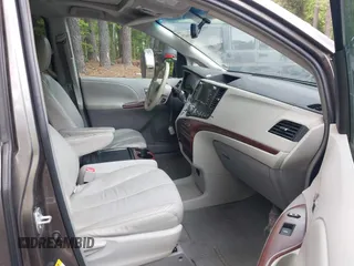 2011 Toyota Sienna XLE AAS with VIN 5TDYK3DC8BS016319, listed as a IAAI auction lot 42186294 with 293,401 mi miles and . Bid and sale history available at DreamBid. Image 5.
