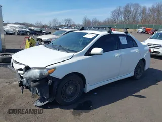 2011 Toyota Corolla L with VIN 2T1BU4EE2BC673146, listed as a IAAI auction lot 41802185 with 183,180 mi miles. Bid and sale history available at carsss.com. Image 2.
