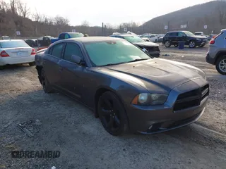 2014 Dodge Charger SXT with VIN 2C3CDXHG1EH115998, listed as a IAAI auction lot 41661367 with 155,327 mi miles. Bid and sale history available at carsss.com. Image 1.