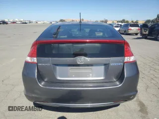 2011 Honda Insight EX z VIN JHMZE2H71BS006434, wystawiony jako Copart lot #58045495 z przebiegiem 270 645 mil mil oraz Czysty tytuł • Clean title. Historia ofert i sprzedaży dostępna na DreamBid. Obrazek 6.