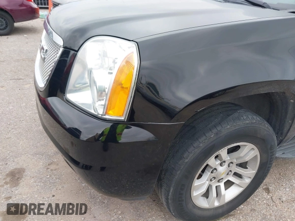 2009 GMC Yukon SLT w/4SA with VIN 1GKFC33J39R295065, listed as a IAAI auction lot 41514132 with 216,680 mi miles. Bid and sale history available at carsss.com. Image 6.
