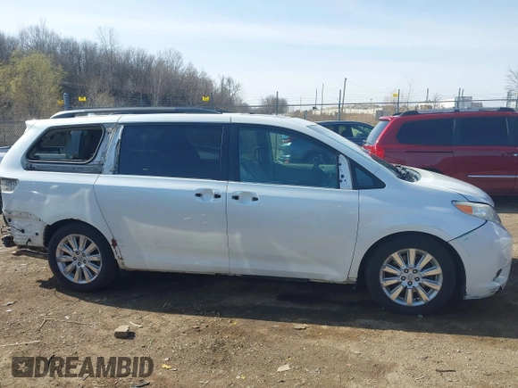 2011 Toyota Sienna XLE with VIN 5TDDK3DC4BS013416, listed as a IAAI auction lot 41933299 with 170,479 mi miles and . Bid and sale history available at DreamBid. Image 14.