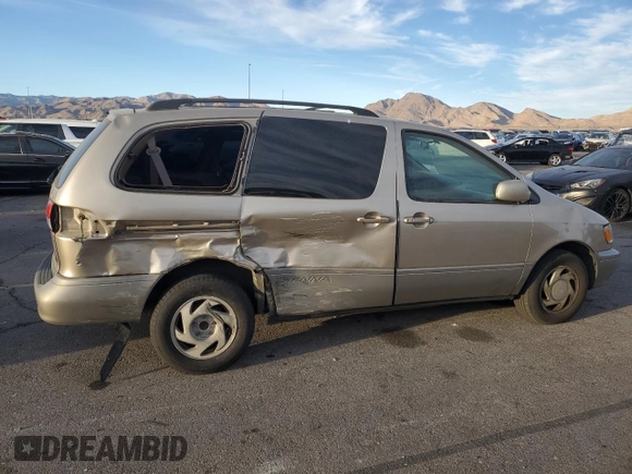 2002 Toyota Sienna LE with VIN 4T3ZF13C12U486009, listed as a Copart auction lot 87877695 with 250,778 mi miles and Salvage Title. Bid and sale history available at carsss.com. Image 3.