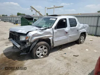 2007 Honda Ridgeline RTL with VIN 2HJYK16547H533699, listed as a Copart auction lot 61100115 with 241,366 mi miles and Salvage title. Bid and sale history available at DreamBid. Image 1.