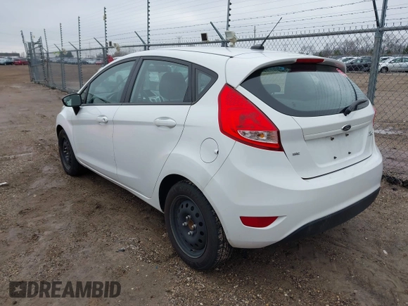 2013 Ford Fiesta SE with VIN 3FADP4EJ8DM193710, listed as a IAAI auction lot 42020003 with 95,625 mi miles. Bid and sale history available at carsss.com. Image 3.