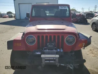 2000 Jeep Wrangler Sport with VIN 1J4FA49S1YP703560, listed as a Copart auction lot 73647844 with 117,300 mi miles and Salvage Title. Bid and sale history available at carsss.com. Image 5.
