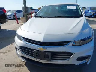 2018 Chevrolet Malibu LT z VIN 1G1ZD5ST6JF226101, wystawiony jako IAAI lot #42455355 z przebiegiem 119 081 mil mil oraz . Historia ofert i sprzedaży dostępna na DreamBid. Obrazek 12.