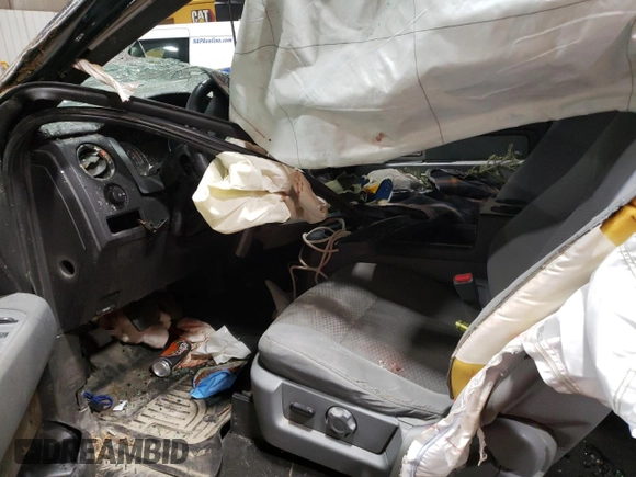2011 Ford F-150 XL with VIN 1FTFW1EF9BFD15357, listed as a Copart auction lot 49327595 with 182,707 mi miles and Salvage title. Bid and sale history available at DreamBid. Image 7.