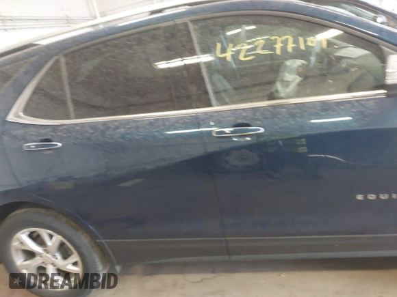 2019 Chevrolet Equinox Premier z VIN 2GNAXXEV9K6265112, wystawiony jako IAAI lot #42277109 z przebiegiem 64 261 mil mil oraz . Historia ofert i sprzedaży dostępna na DreamBid. Obrazek 12.