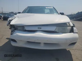 1999 Nissan Sentra XE with VIN 1N4AB41D2XC700091, listed as a Copart auction lot 59734435 with 53,658 mi miles and Salvage title. Bid and sale history available at DreamBid. Image 5.
