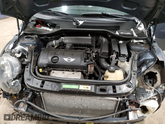 2010 MINI Hardtop z VIN WMWMF3C55ATZ67130, wystawiony jako Copart lot #51225575 z przebiegiem 200 279 mil mil oraz Szkoda całkowita • Salvage title. Historia ofert i sprzedaży dostępna na DreamBid. Obrazek 11.