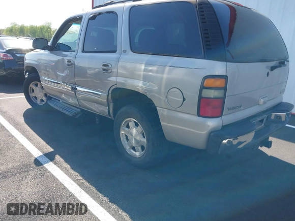 2004 GMC Yukon SLT with VIN 1GKEK13Z14J173689, listed as a IAAI auction lot 41979936 with 1 mi miles. Bid and sale history available at carsss.com. Image 3.