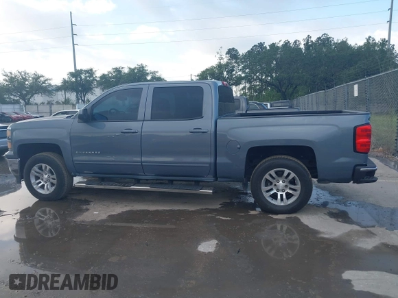 2015 Chevrolet Silverado 1500 LT with VIN 3GCUKREC8FG535021, listed as a IAAI auction lot 42154626 with 125,897 mi miles and . Bid and sale history available at DreamBid. Image 14.