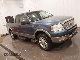2004 Ford F-150 XLT with VIN 1FTPX14574NB67924, listed as a IAAI auction lot 41880378 with 148,559 mi miles. Bid and sale history available at carsss.com. Image 1.