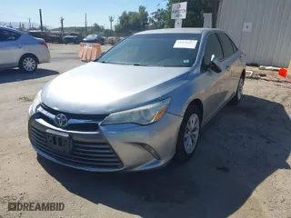 2015 Toyota Camry XLE with VIN 4T4BF1FK9FR499888, listed as a IAAI auction lot 41676657 with 148,310 mi miles. Bid and sale history available at carsss.com. Image 2.