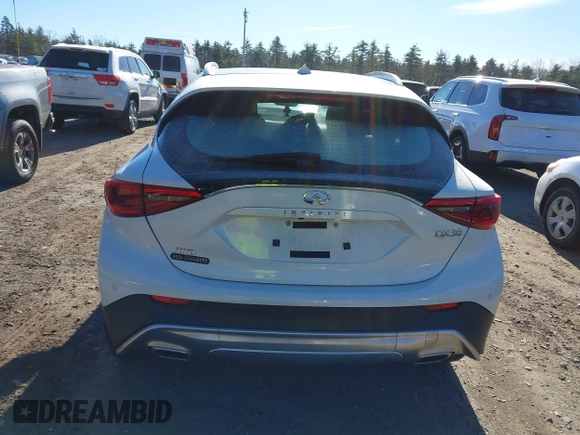 2018 Infiniti QX30 Luxury with VIN SJKCH5CR0JA056820, listed as a IAAI auction lot 40974821 with 71,902 mi miles and . Bid and sale history available at DreamBid. Image 16.