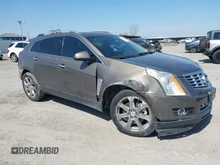 2015 Cadillac SRX Performance Collection with VIN 3GYFNCE31FS598109, listed as a IAAI auction lot 41788267 with 172,488 mi miles and . Bid and sale history available at DreamBid. Image 6.