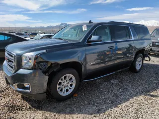 2019 GMC Yukon XL SLT with VIN 1GKS2GKC4KR302722, listed as a Copart auction lot 50834465 with 99,373 mi miles and Salvage Title. Bid and sale history available at carsss.com. Image 1.