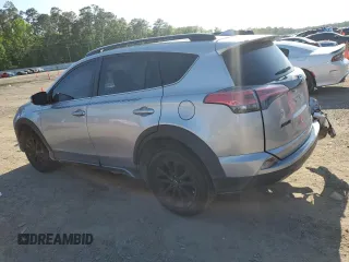 2018 Toyota RAV4 XLE with VIN 2T3RFREV5JW731373, listed as a Copart auction lot 51917465 with 124,623 mi miles and Salvage Title. Bid and sale history available at DreamBid. Image 2.