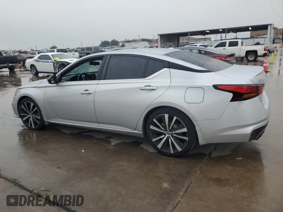 2022 Nissan Altima 2.0 SR with VIN 1N4AL4CV8NN303537, listed as a Copart auction lot 83427364 with 112,781 mi miles and Salvage Title. Bid and sale history available at carsss.com. Image 2.