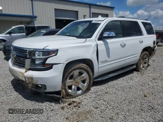 2018 Chevrolet Tahoe Premier with VIN 1GNSKCKC5JR357268, listed as a Copart auction lot 56498215 with 173,591 mi miles and Salvage title. Bid and sale history available at DreamBid. Image 1.
