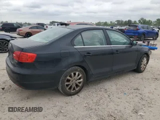 2013 Volkswagen Jetta SE with VIN 3VWDX7AJXDM400161, listed as a Copart auction lot 53249335 with 104,882 mi miles and Salvage title. Bid and sale history available at DreamBid. Image 3.