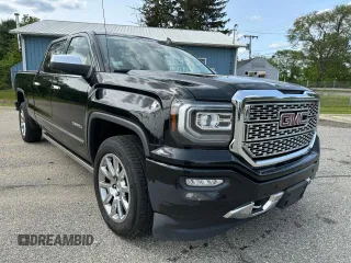 2018 GMC Sierra 1500 Denali z VIN 3GTU2PEJXJG171695, wystawiony jako Copart lot #59631005 z przebiegiem 226 029 mil mil oraz Czysty tytuł • Clean title. Historia ofert i sprzedaży dostępna na DreamBid. Obrazek 1.