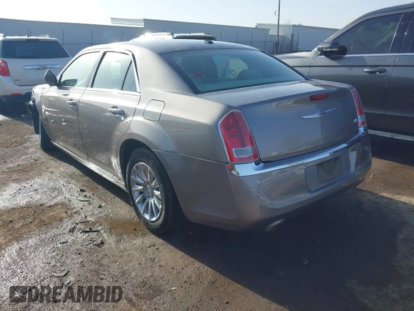 2014 Chrysler 300 with VIN 2C3CCAAG4EH159911, listed as a IAAI auction lot 41963042 with 105,972 mi miles and . Bid and sale history available at DreamBid. Image 3.