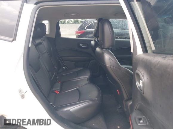 2020 Jeep Compass Trailhawk with VIN 3C4NJDDB3LT118928, listed as a IAAI auction lot 42128120 with 95,477 mi miles and . Bid and sale history available at DreamBid. Image 8.