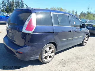 2009 Mazda Mazda5 Sport with VIN JM1CR293090344744, listed as a IAAI auction lot 42042896 with 215,303 mi miles. Bid and sale history available at carsss.com. Image 4.