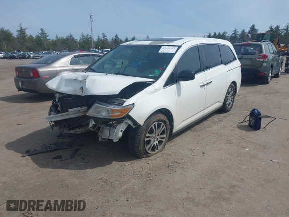 2012 Honda Odyssey EX-L with VIN 5FNRL5H65CB082916, listed as a IAAI auction lot 42052713 with 217,267 mi miles and . Bid and sale history available at carsss.com. Image 2.