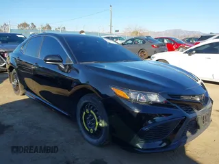 2021 Toyota Camry SE Nightshade with VIN 4T1G11AK2MU477363, listed as a IAAI auction lot 41675959 with 57,507 mi miles. Bid and sale history available at carsss.com. Image 1.