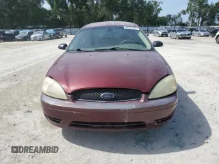 2007 Ford Taurus SE with VIN 1FAFP53U17A151246, listed as a Copart auction lot 60221955 with 284,321 mi miles and Salvage title. Bid and sale history available at DreamBid. Image 5.