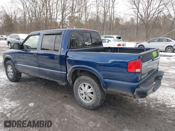 2002 GMC Sonoma SLS with VIN 1GTDT13W12K158613, listed as a IAAI auction lot 41524710 with 217,785 mi miles. Bid and sale history available at carsss.com. Image 14.