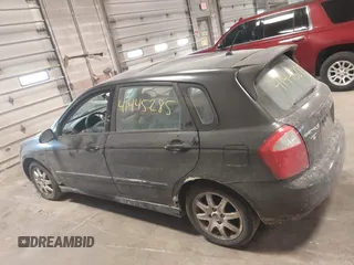 2005 Kia Spectra with VIN KNAFE161255083357, listed as a IAAI auction lot 41445285 with 90,349 mi miles. Bid and sale history available at carsss.com. Image 15.
