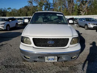 1999 Ford F-150 with VIN 2FTRX18W4XCA10583, listed as a Copart auction lot 44982655 with Not provided miles and Salvage title. Bid and sale history available at DreamBid. Image 5.