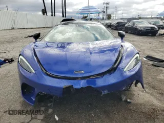 2023 McLaren GT z VIN SBM22GCA9PW003039, wystawiony jako Copart lot #47143765 z przebiegiem 2775 mil mil oraz Szkody całkowita. Historia ofert i sprzedaży dostępna na DreamBid. Obrazek 5.