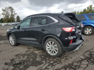 2021 Ford Escape Titanium with VIN 1FMCU9J98MUA73257, listed as a Copart auction lot 74838394 with 41,294 mi miles and Salvage Title. Bid and sale history available at carsss.com. Image 2.