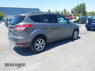 2013 Ford Escape SEL with VIN 1FMCU0HX0DUC16069, listed as a IAAI auction lot 42638924 with 80,200 mi miles and . Bid and sale history available at DreamBid. Image 4.