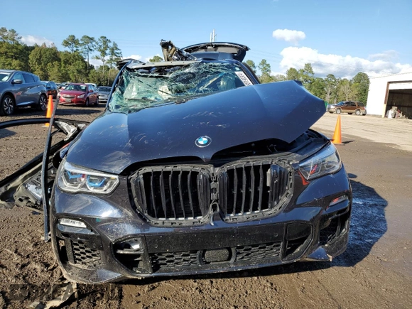 2020 BMW X5 M50i with VIN 5UXJU4C05LLE45415, listed as a Copart auction lot 80190304 with Not Provided miles and Salvage Title. Bid and sale history available at DreamBid. Image 5.
