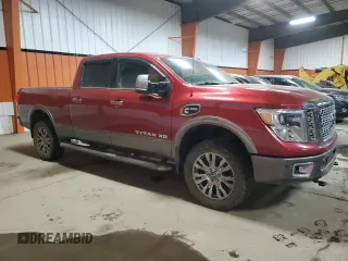 2016 Nissan Titan XD PRO-4X with VIN 1N6BA1F47GN511026, listed as a Copart auction lot 81368224 with 121,357 mi miles and Clean Title. Bid and sale history available at carsss.com. Image 4.