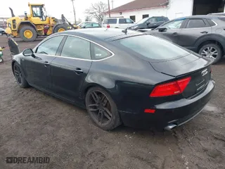 2013 Audi A7 3.0 Premium Plus with VIN WAUYGAFCXDN084307, listed as a IAAI auction lot 41875312 with 120,354 mi miles. Bid and sale history available at carsss.com. Image 3.