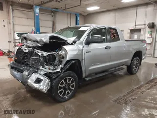 2014 Toyota Tundra 4WD Truck SR with VIN 5TFUY5F17EX357035, listed as a IAAI auction lot 39928076 with 129,831 mi miles. Bid and sale history available at carsss.com. Image 17.