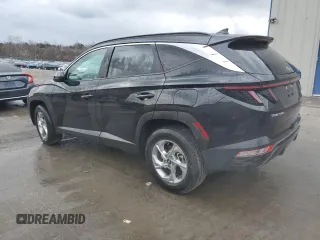 2023 Hyundai Tucson SEL with VIN 5NMJBCAE2PH270674, listed as a Copart auction lot 82879614 with 11,673 mi miles and Salvage Title. Bid and sale history available at DreamBid. Image 2.