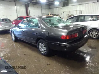 2001 Toyota Camry CE with VIN 4T1BG22K21U781964, listed as a IAAI auction lot 35629457 with 171,488 mi miles. Bid and sale history available at carsss.com. Image 3.