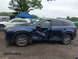 2019 Mazda CX-9 Touring with VIN JM3TCBCY6K0334898, listed as a IAAI auction lot 42467677 with 69,454 mi miles and . Bid and sale history available at DreamBid. Image 14.