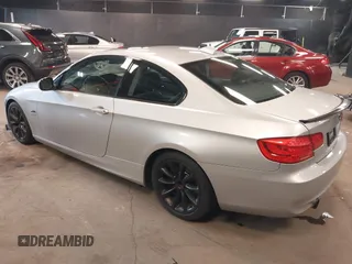 2011 BMW 3 Series 335i xDrive with VIN WBAKF9C56BE261882, listed as a IAAI auction lot 42393269 with 131,000 mi miles and . Bid and sale history available at DreamBid. Image 3.