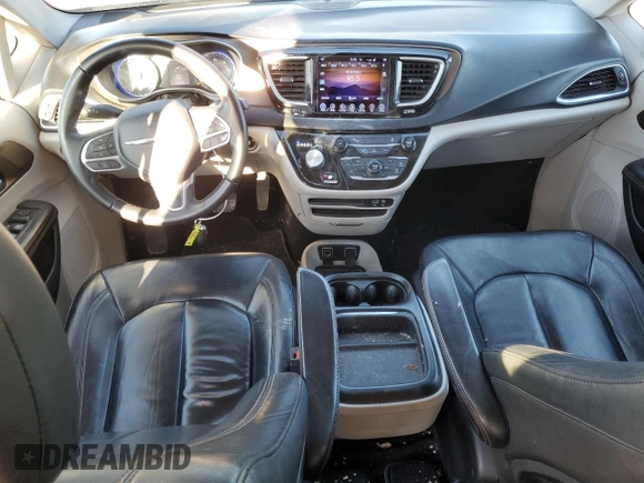 2017 Chrysler Pacifica Touring L with VIN 2C4RC1BG7HR569315, listed as a Copart auction lot 47018605 with 131,519 mi miles and Salvage Title. Bid and sale history available at DreamBid. Image 8.