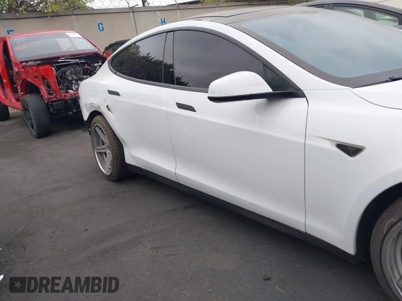 2013 Tesla Model S with VIN 5YJSA1CN1DFP07344, listed as a IAAI auction lot 42746574 with 181,538 mi miles and . Bid and sale history available at DreamBid. Image 13.